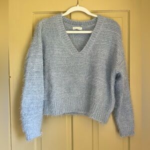 Light blue sweater